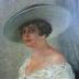 Portrait of a lady in armchair