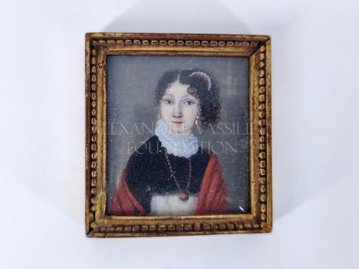 Portrait of a young lady in red shawl