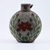 Beaded bottle