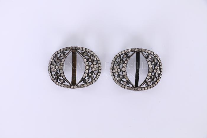 Pair of belt buckles