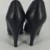 Pair of peek-a-boo toe shoes