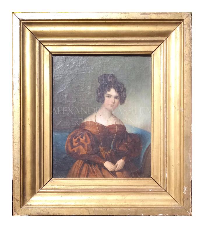 Portrait of a young woman in a silk dress